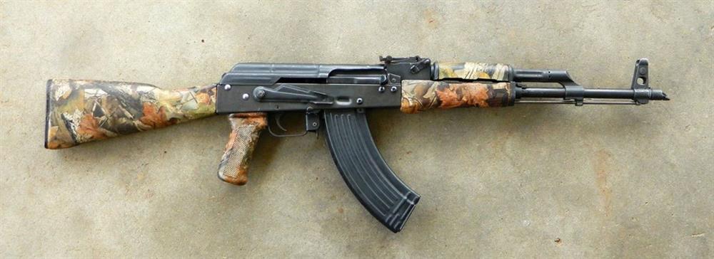 AK-47 rifle with camouflage furniture