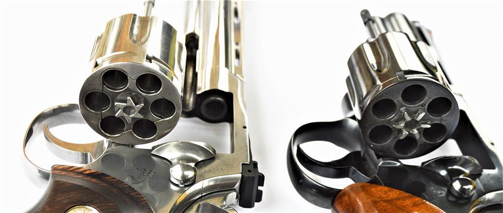 comparing the cylinder and ejector rod of the old and new Colt Python