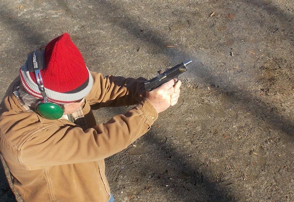 Overhead view of Bob Campbell shooting controlled pairs with the Dan Wesson Guardian Commander-length pistol