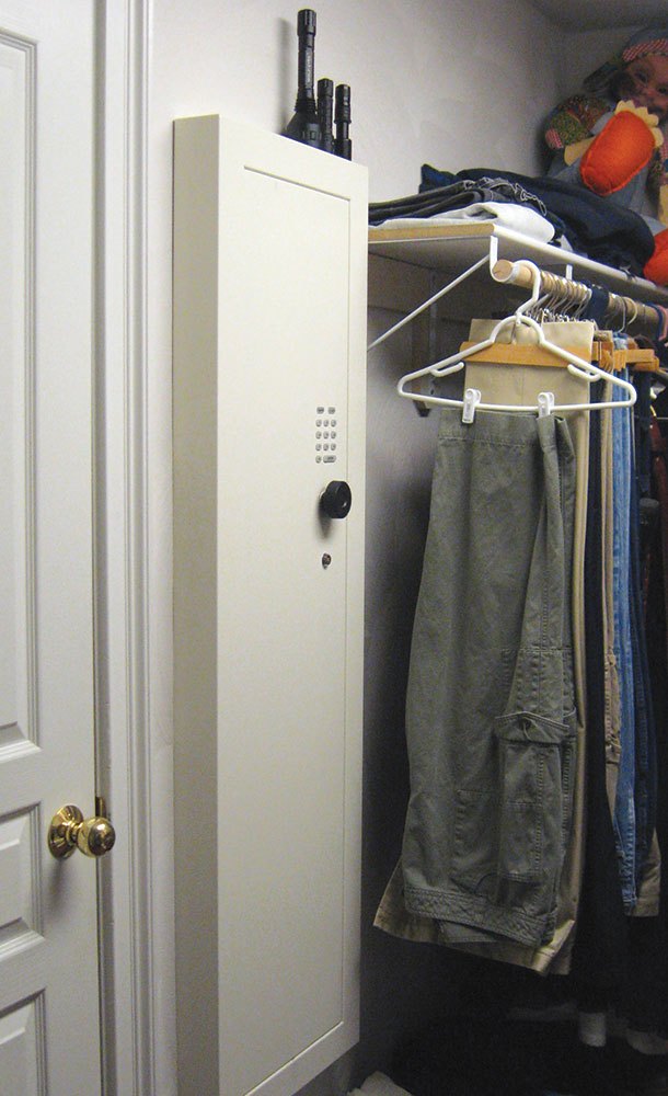 quick action rifle safe mounted in a closet