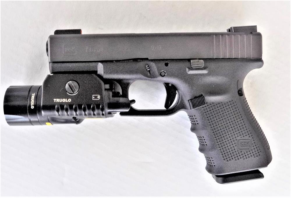 Glock 19 left profile with TruGlo combat light