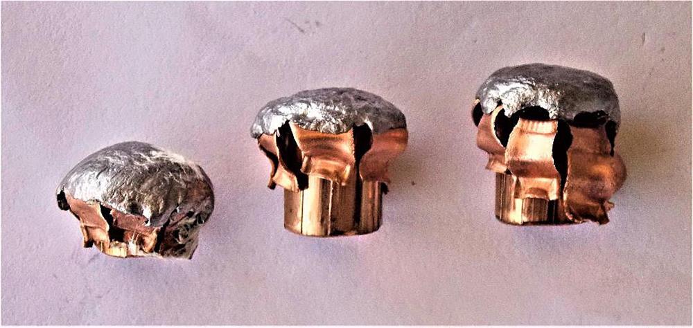 Side view of upset 25-, 158- and 180-grain Hornady XTP bullets