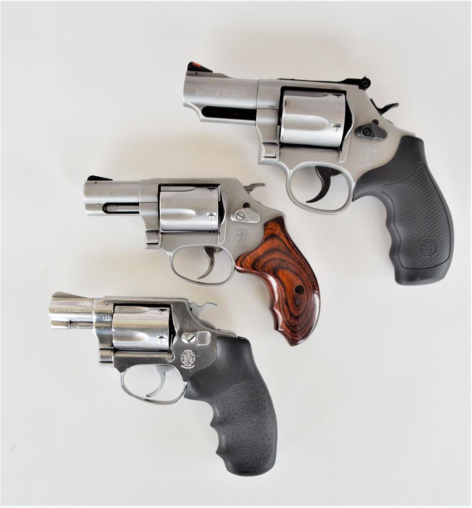 three snubnose revolvers