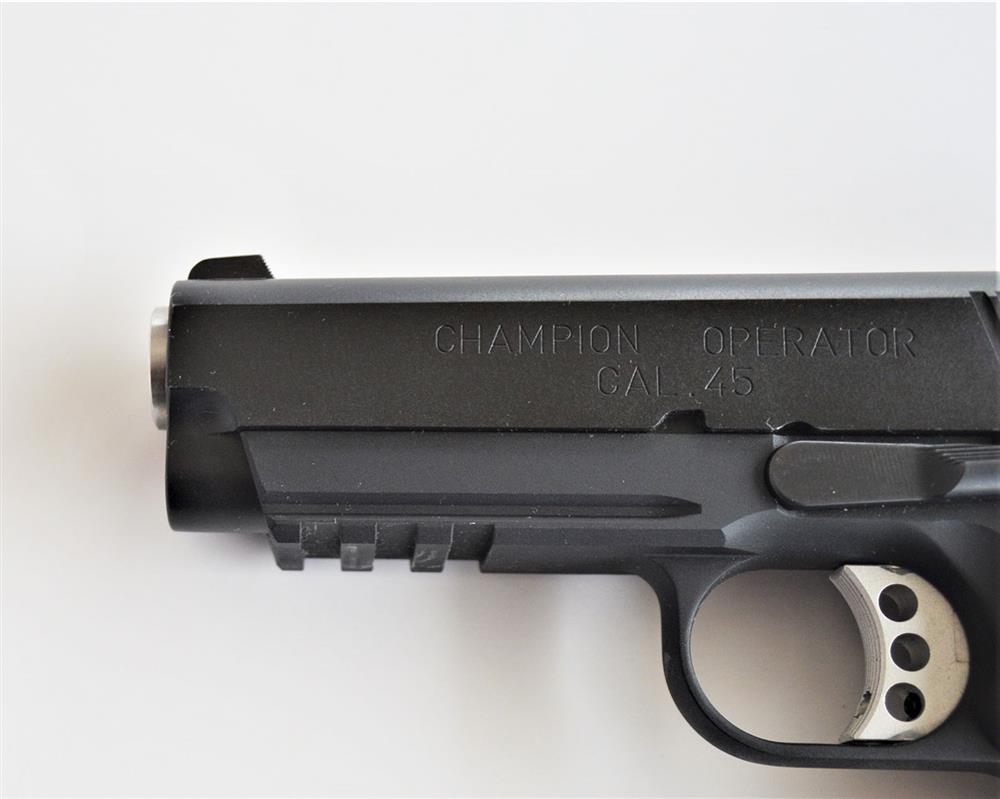 handgun dust cover with Picatinny rail which could be a problem for holsterless carry