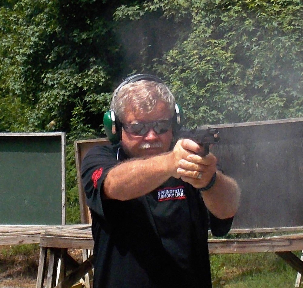 Bob Campbell shooting a pistol loaded with lead bullets