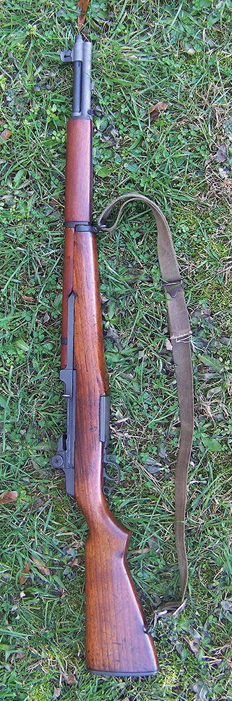 M1 Garand rifle laying in the grass