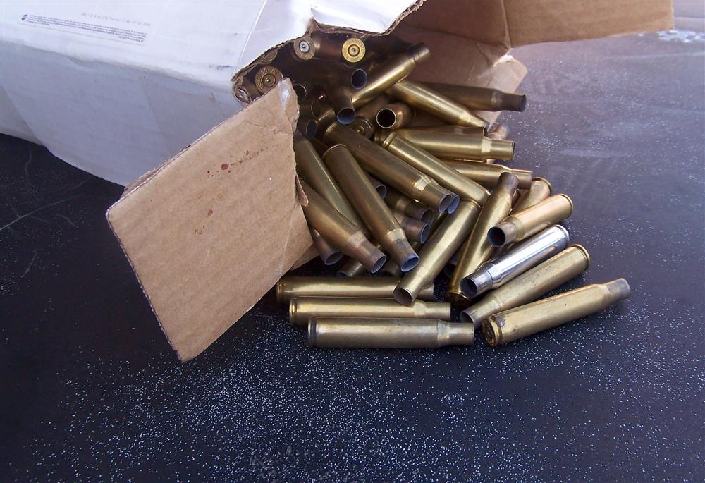 Box of empty rifle cartridge cases