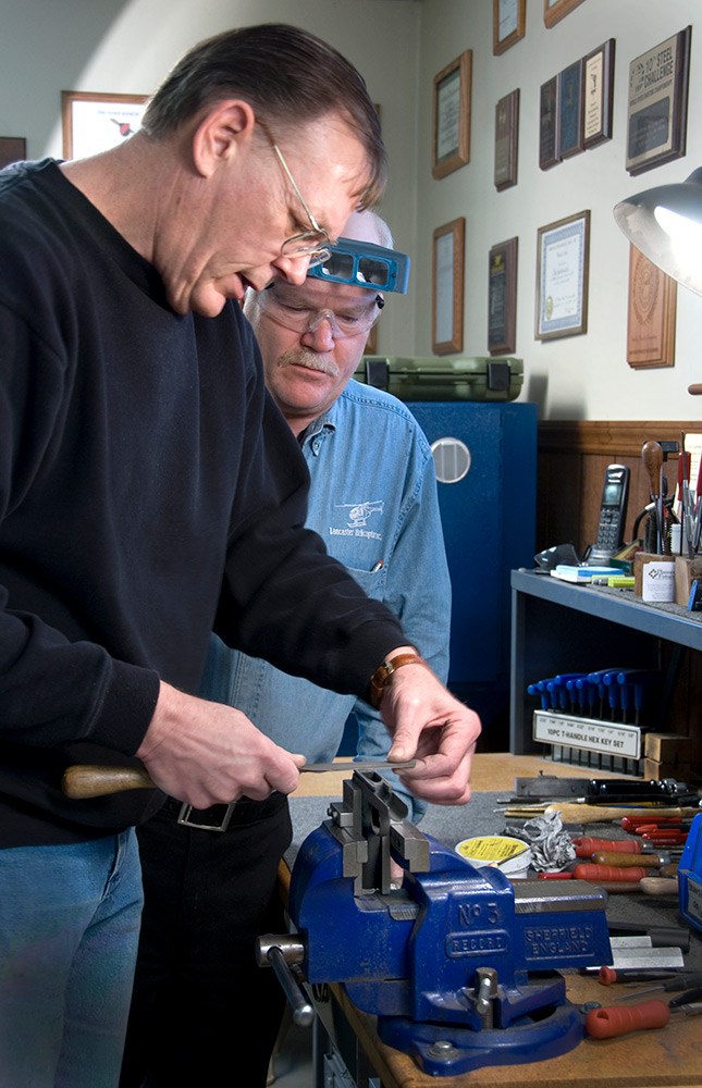 filing the top of the frame of a 1911 pistol