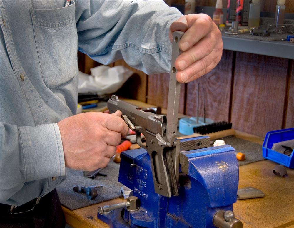 working on a 1911 that is held by a vice