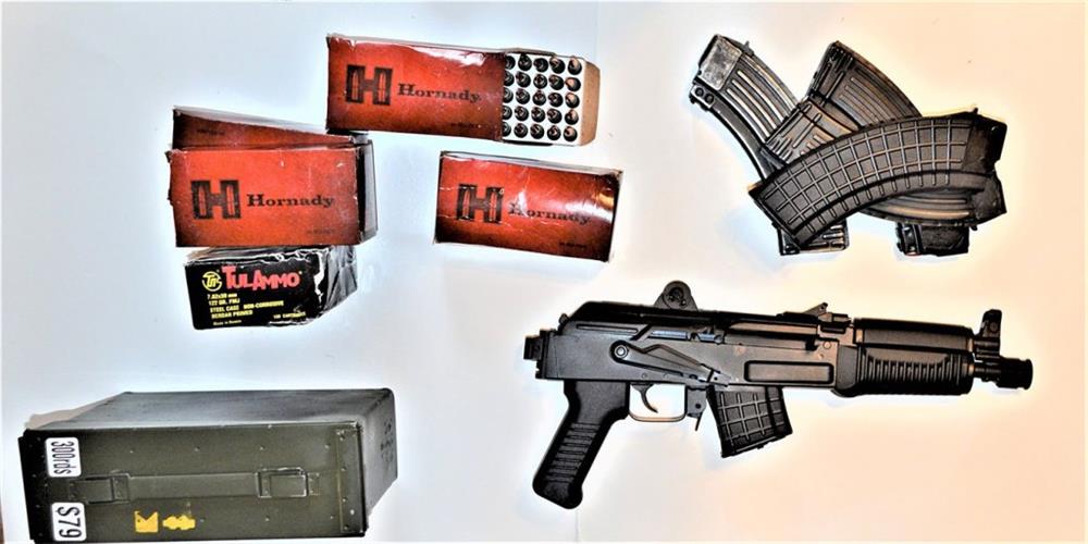 Arsenal SAM7K-44 pistol, Hornady ammunition boxes, magazines, and green ammo can