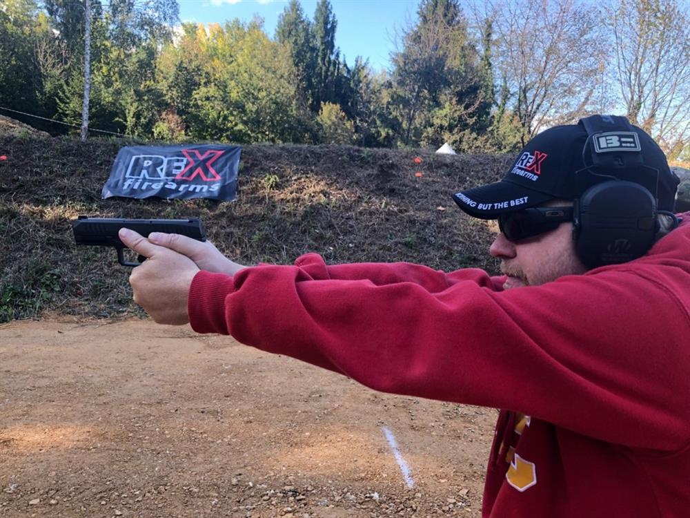 Dave Dolbee firing the Arex Rex Delta pistol.