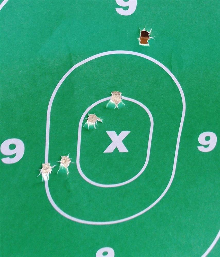 pistol group on a green target