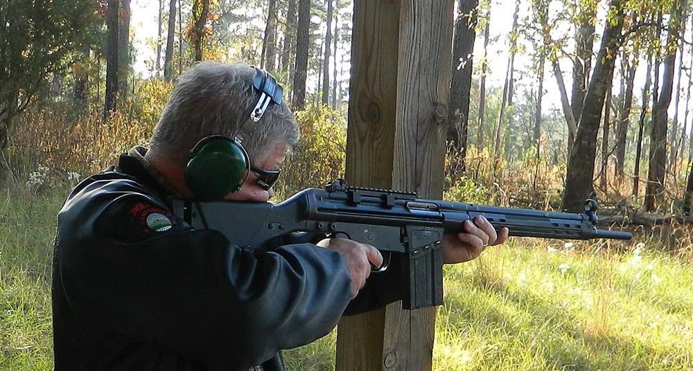 Firing a rifle from a braced position