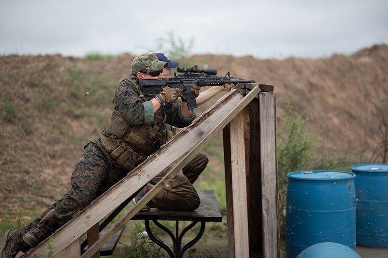 Shooter laying on an angled barricade